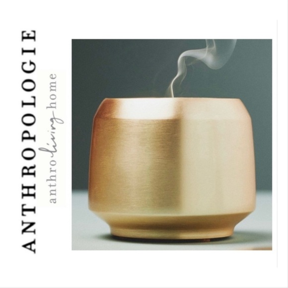 New in box! Large Anthropologie candle.
Amber Topaz. - Picture 2 of 9